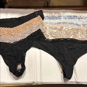9 pair of Victoria’s Secret thong panties. Size large